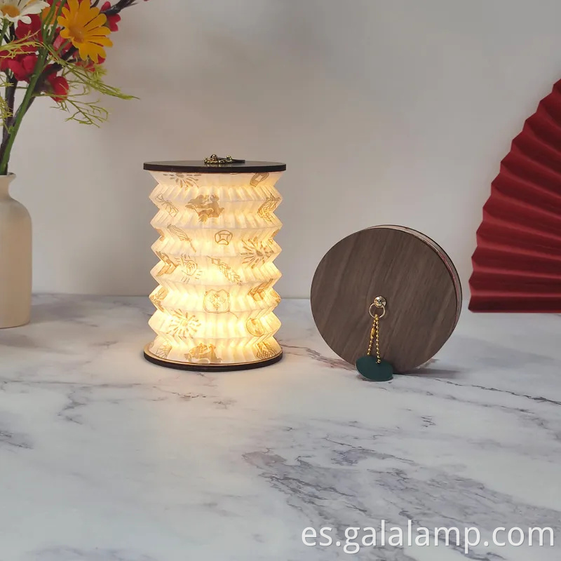 Elegante luz nocturna de linterna de papel portátil para espacios acogedores